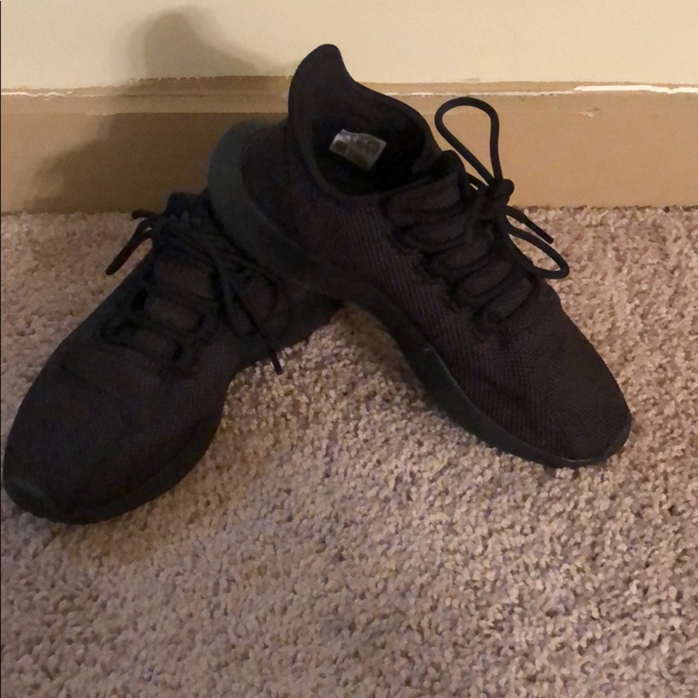 All black adidas tubulars